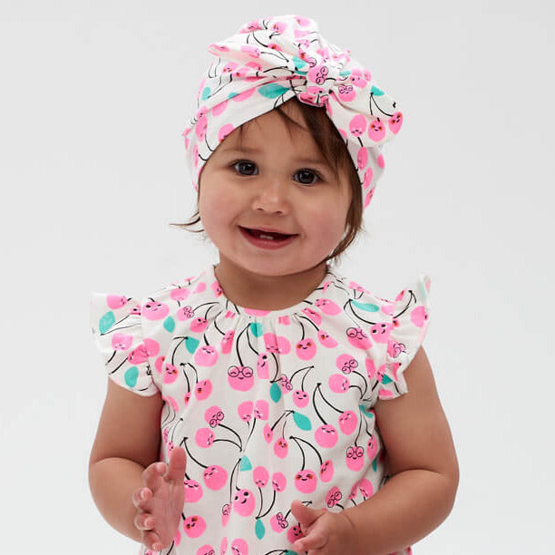 
            
                Load image into Gallery viewer, The Bonnie Mob - Peninsula Turban Baby Hat: Cherries
            
        